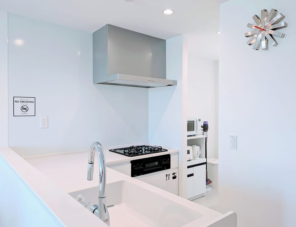 Standard Condo, Balcony | Private kitchen | Electric kettle