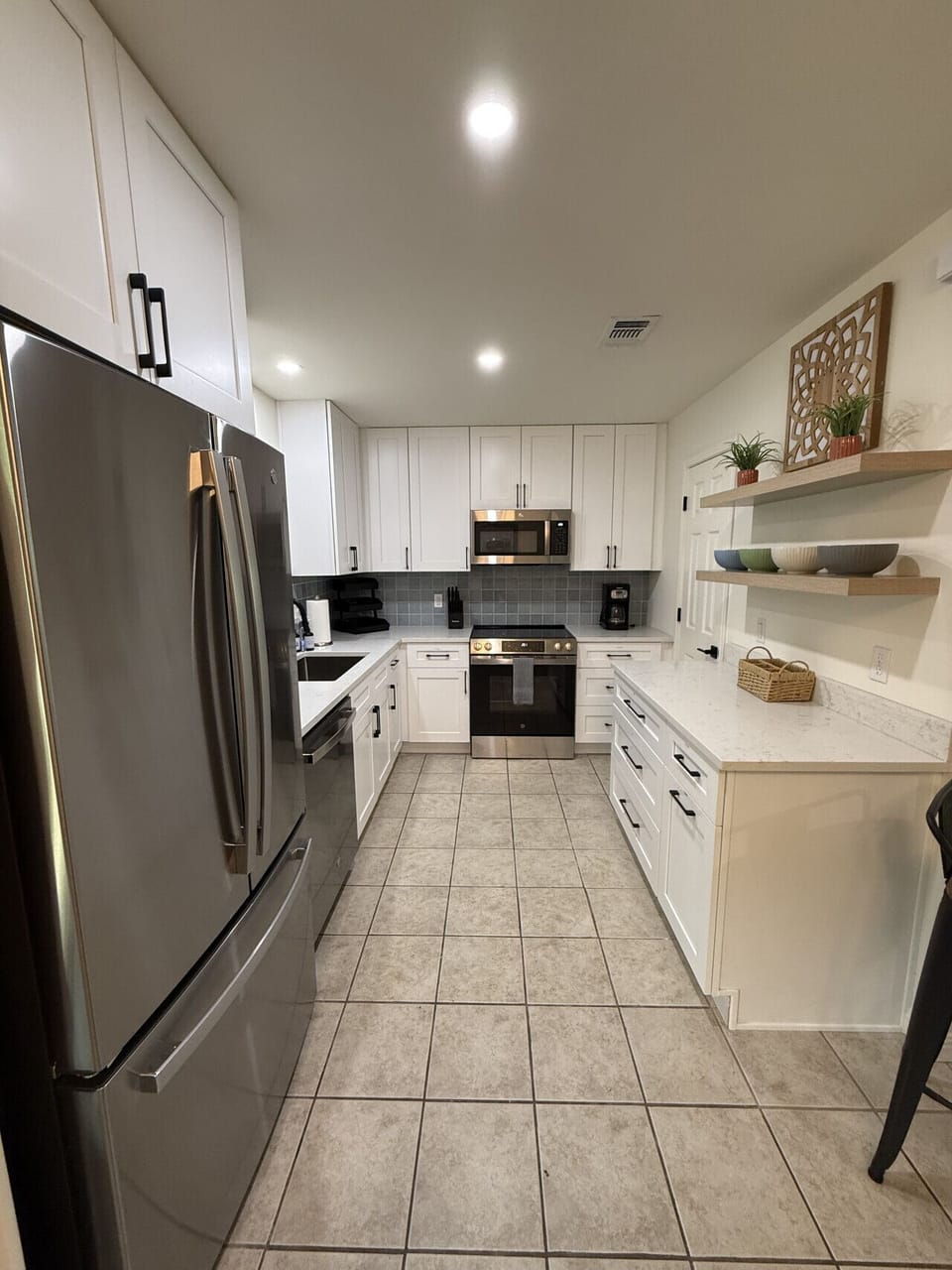 Kitchen with brand new stainless steel appliances