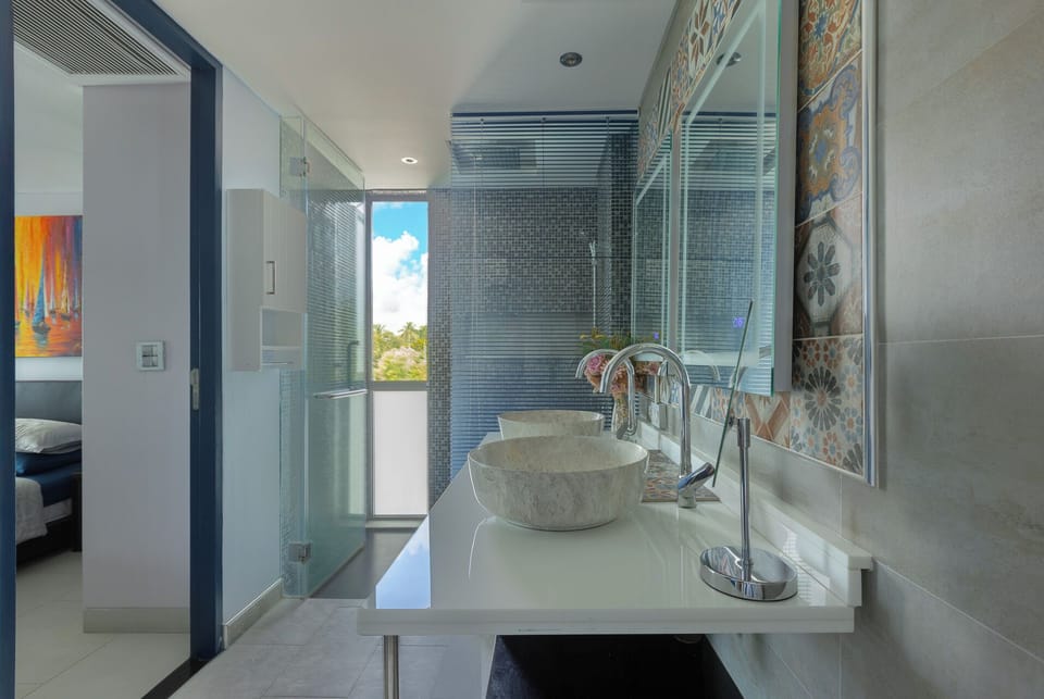 Large Bathroom, shoer cubicle, toilet & two basins