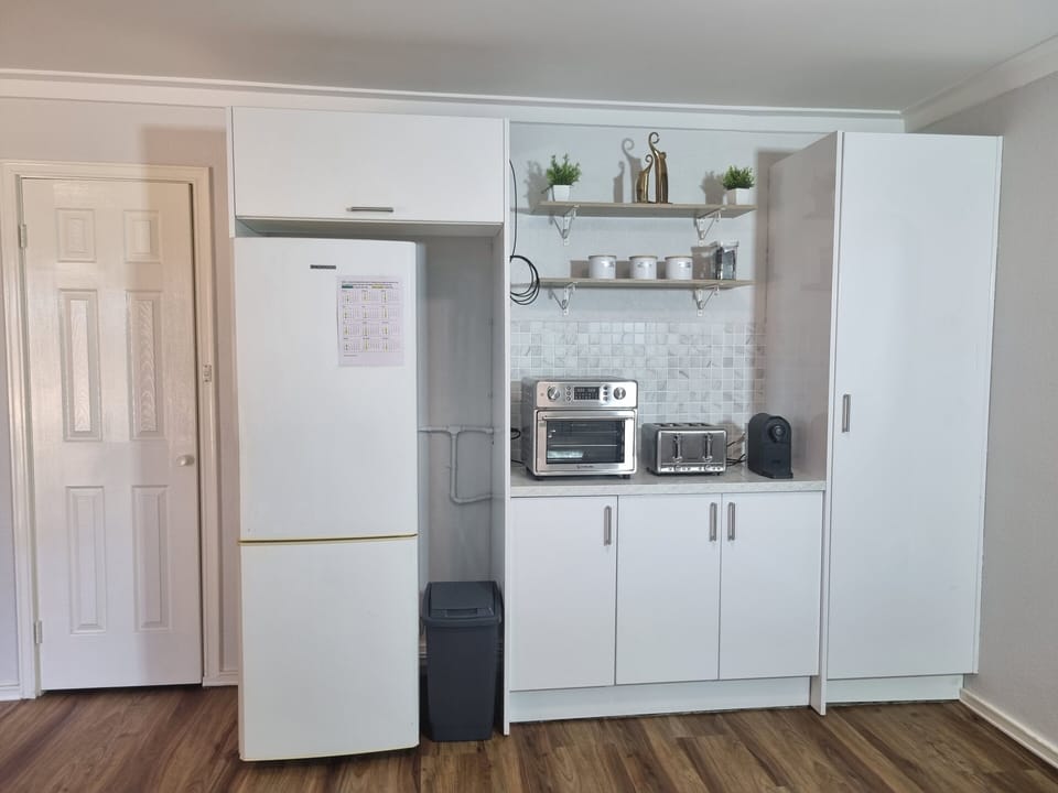 You will love this appliance area - air fryer, toaster, coffee pod machine etc