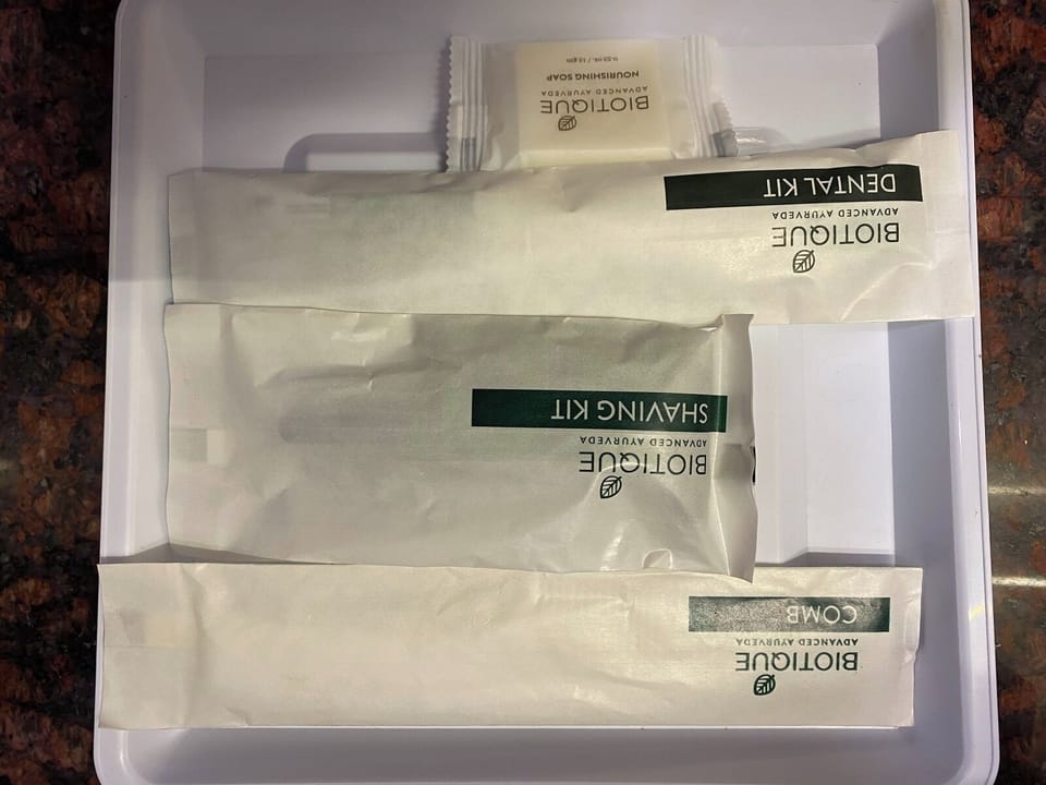 Shower, slippers, towels, soap