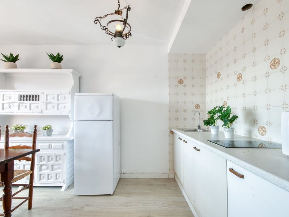 Interior Design, Wall, Cabinetry, Wood, Flooring, Kitchen, Ceiling, Light Fixture, Floor, Countertop