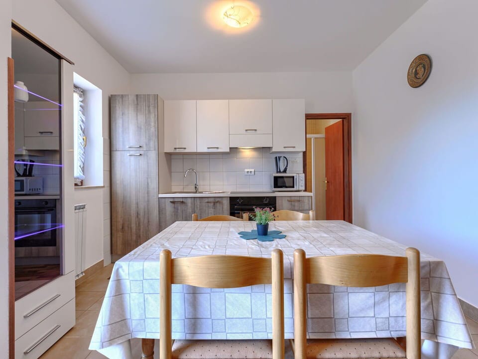 Furniture, Interior Design, Flooring, Wood, Floor, Ceiling, Kitchen, Room, Countertop, Lighting