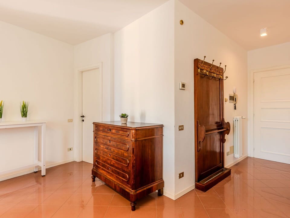 Flooring, Interior Design, Floor, Apartment, Balcony, Ceiling, Condominium, Chair, Shade, Porch
