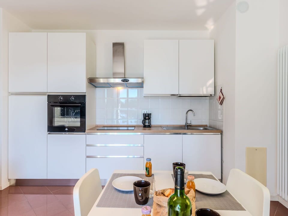 Flooring, Interior Design, Floor, Apartment, Balcony, Ceiling, Condominium, Chair, Shade, Porch