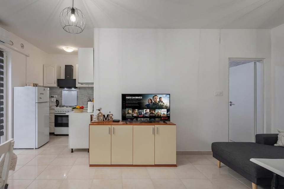 Standard Apartment, Multiple Bedrooms, Mountainside (Terrazza Grande Apartment) | Living area | 21-inch flat-screen TV with digital channels