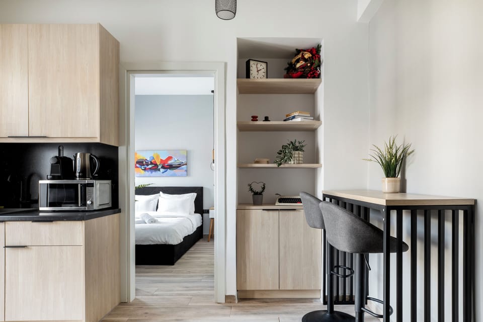 Deluxe Double Room, 1 Bedroom, Balcony, City View | Private kitchen | Full-size fridge, microwave, oven, stovetop