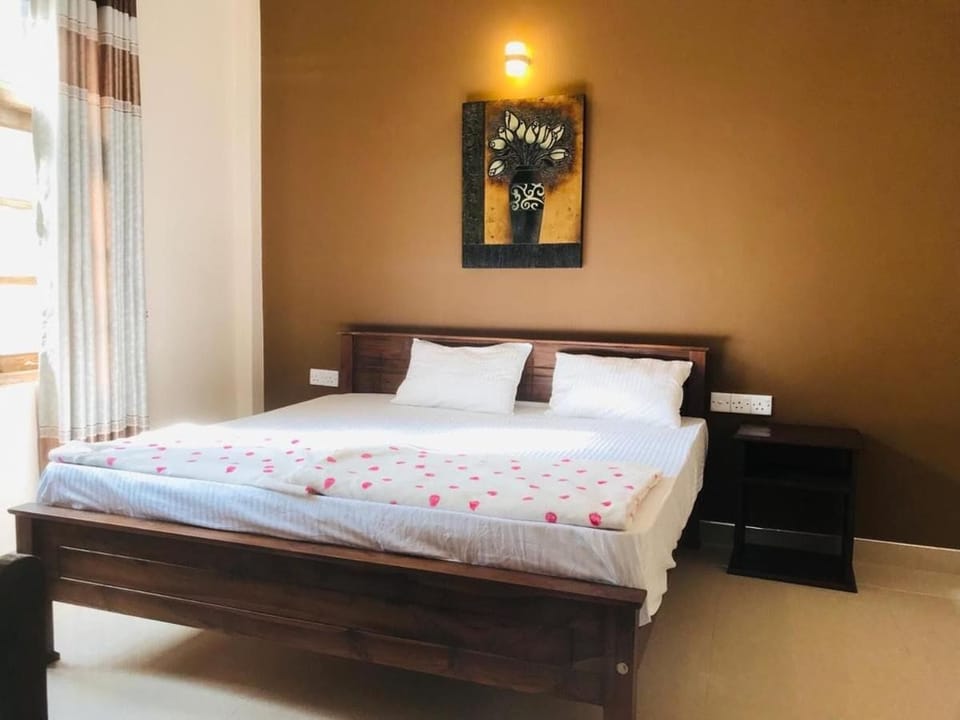 Deluxe Double Room, Garden View | Desk, laptop workspace, iron/ironing board, free WiFi