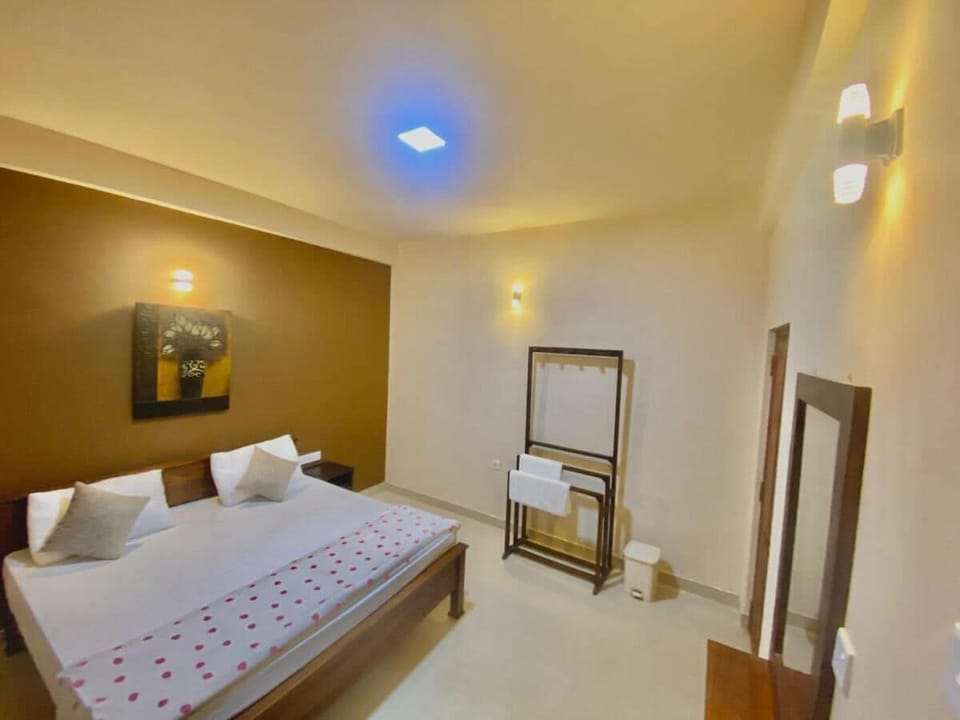 Deluxe Double Room, Garden View | Desk, laptop workspace, iron/ironing board, free WiFi