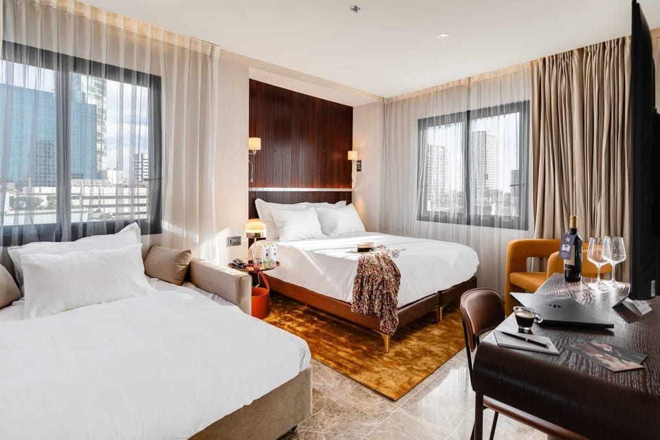 Deluxe Room | Premium bedding, in-room safe, iron/ironing board, free WiFi