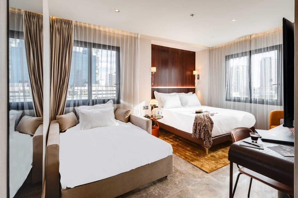 Deluxe Room, City View | Premium bedding, in-room safe, iron/ironing board, free WiFi