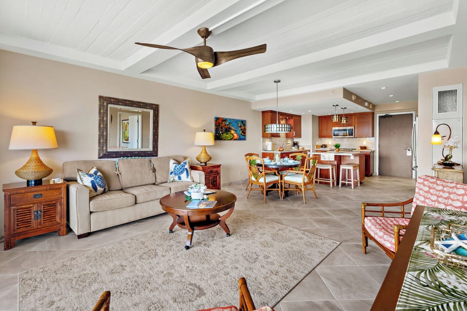 This airy, well-appointed living space offers a relaxed island feel, with a generous layout that flows smoothly from a comfortable lounge area into a welcoming dining space and fully equipped kitchen—ideal for easygoing days and memorable gatherings.