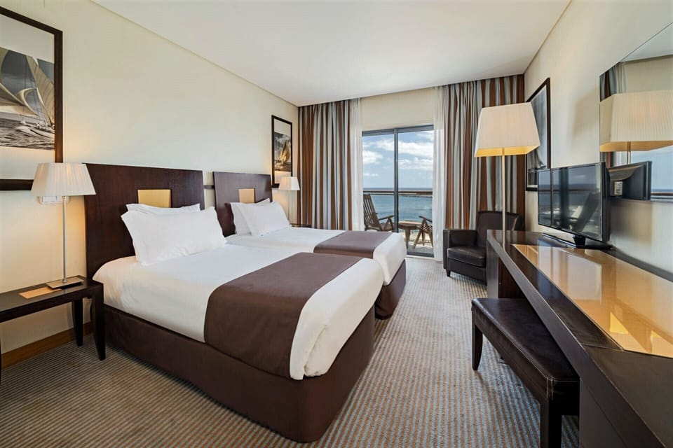 Double or Twin Room, Ocean View | Minibar, in-room safe, desk, laptop workspace