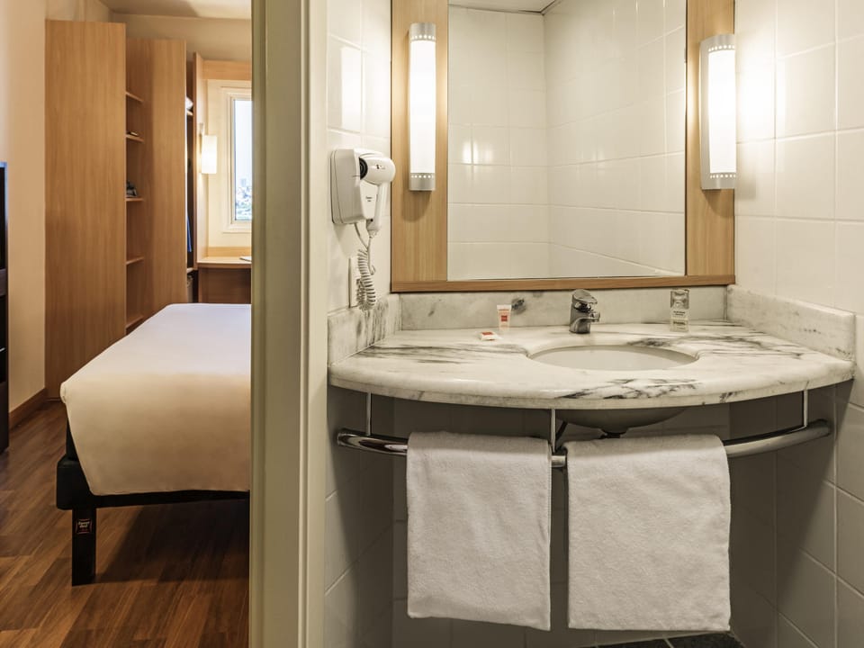 Minibar, desk, blackout drapes, soundproofing