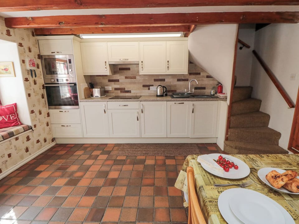 Fridge, microwave, cookware/dishes/utensils