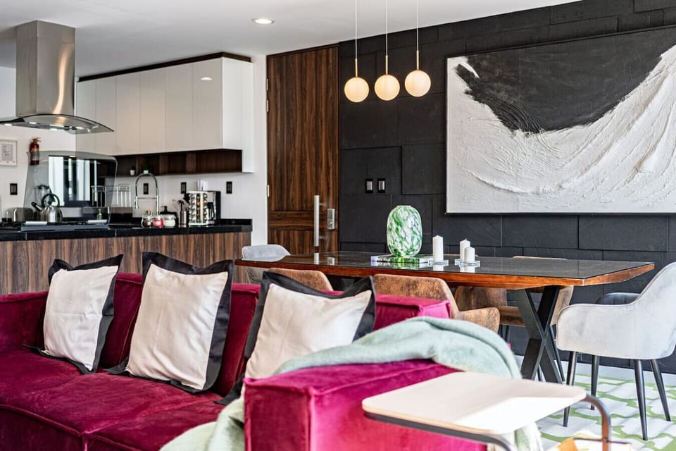 Mid-century modern design with rich textures and bold accent seating