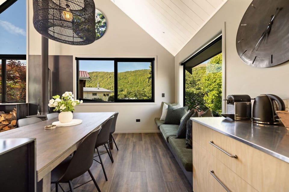 Kitchen & Dining: Sunlit open space with modern decor, perfect for gatherings and gourmet meals!