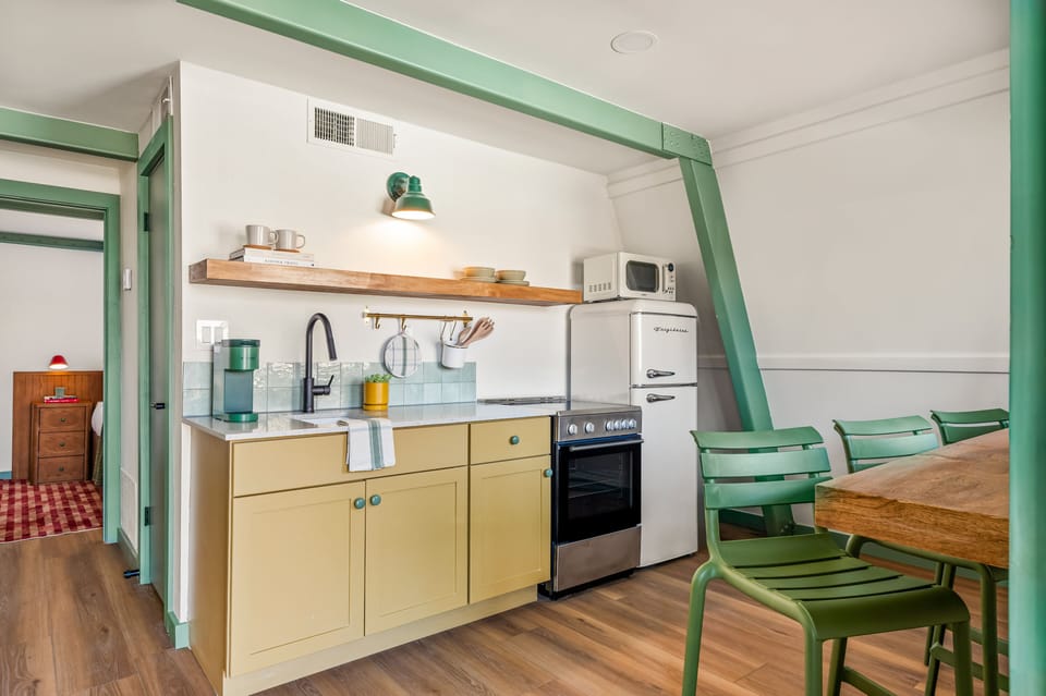 Premium Suite, Pool View | Private kitchen | Coffee/tea maker