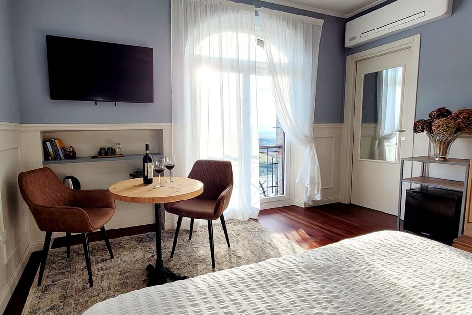 Double or Twin Room, Hill View | In-room safe, desk, free WiFi