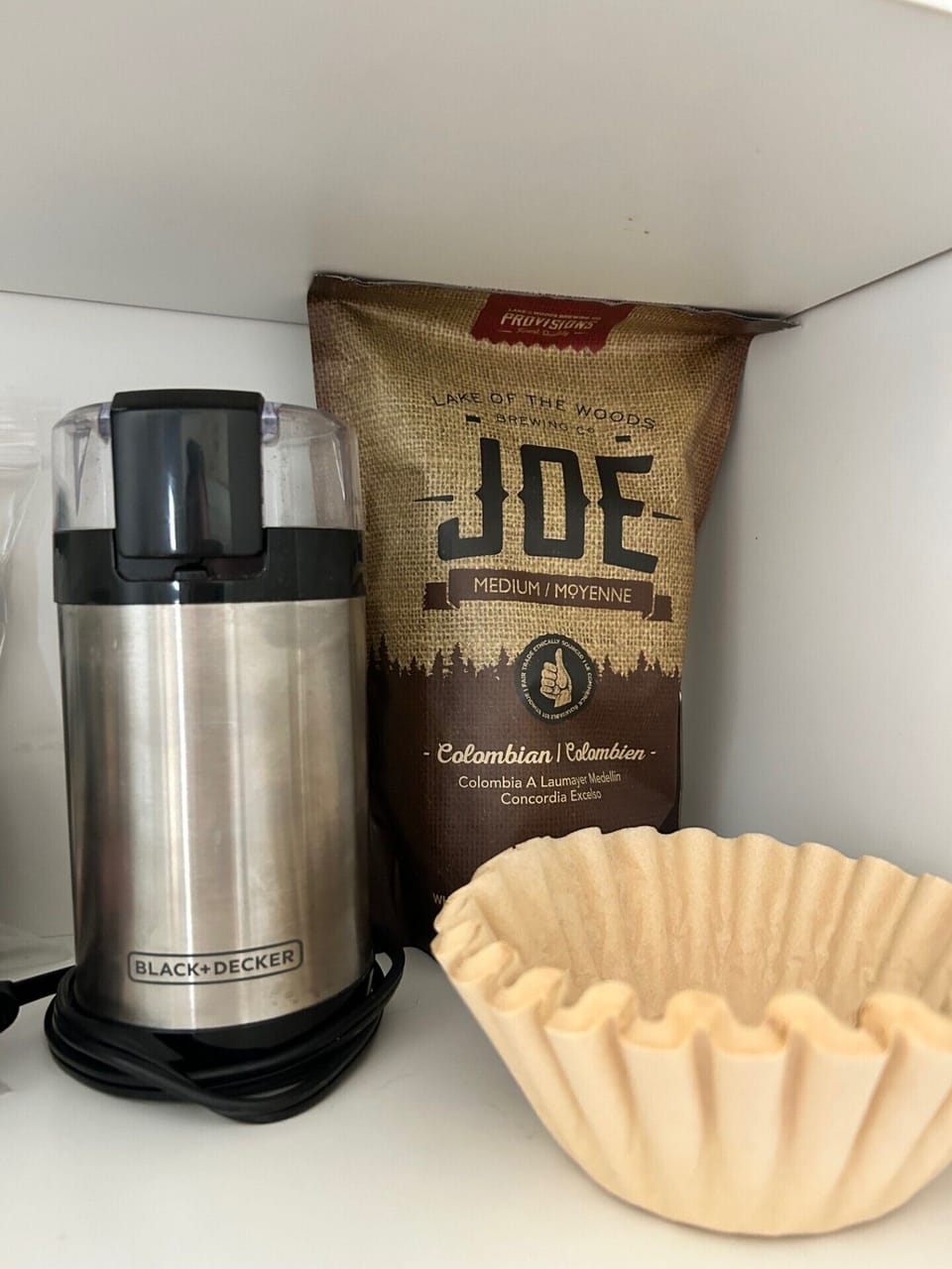 Free coffee beans, espresso, grinder, and filters.