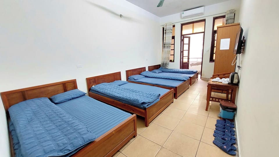 Standard Quadruple Room, City View | Free WiFi, bed sheets
