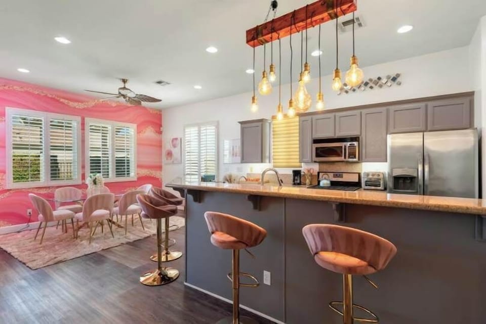 Bright and modern kitchen with stylish bar seating