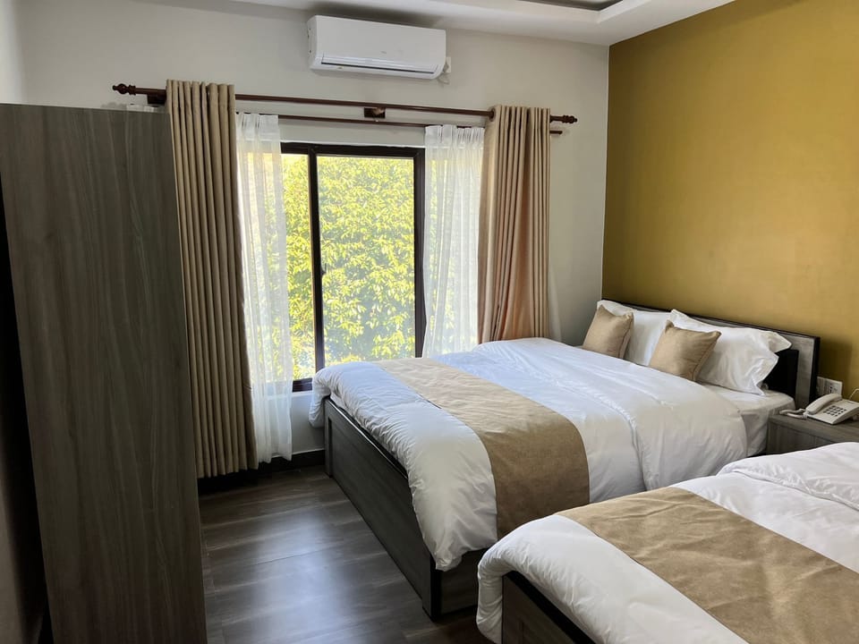 Double or Twin Room, Lake View | Laptop workspace, free WiFi, bed sheets