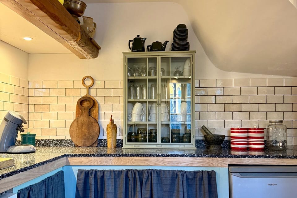 Fully equipped kitchen with large double oven and huge induction hob.  Island cooking over looking the mountains.