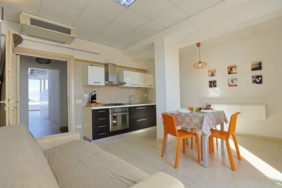 Comfort Suite, Kitchen, Garden View | Desk, laptop workspace, soundproofing, free WiFi