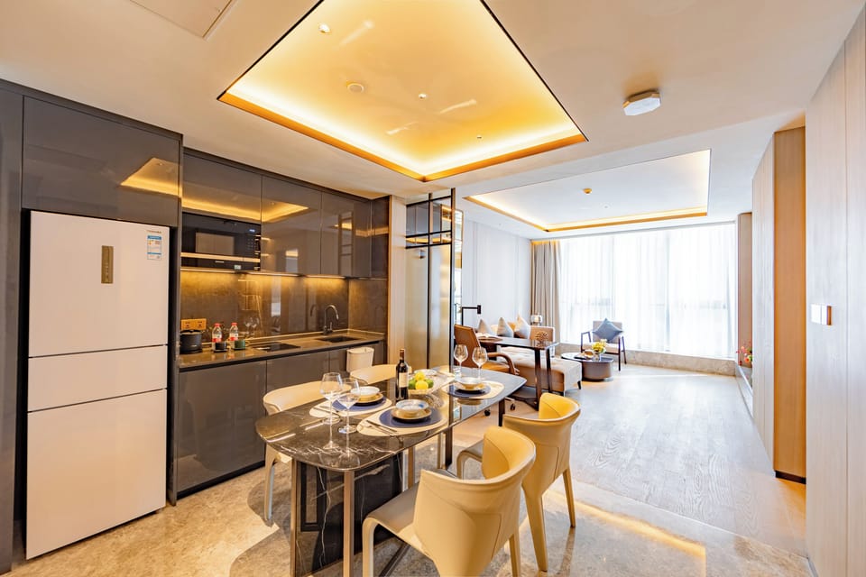 Executive Condo, City View | Living area | LCD TV