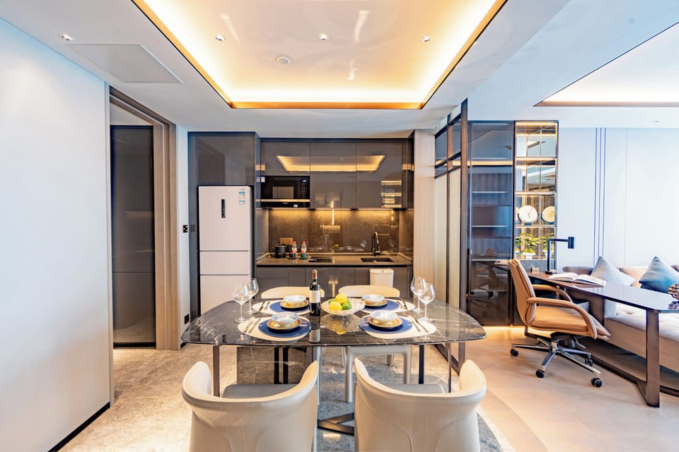 Executive Condo, City View | Living area | LCD TV