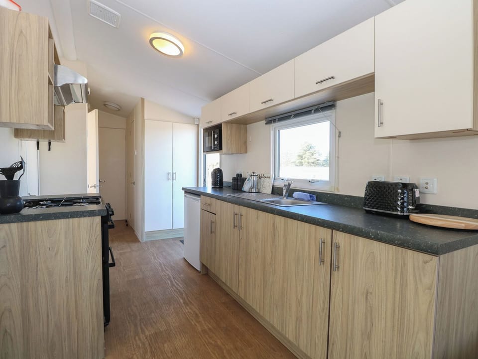 Fridge, microwave, cookware/dishes/utensils