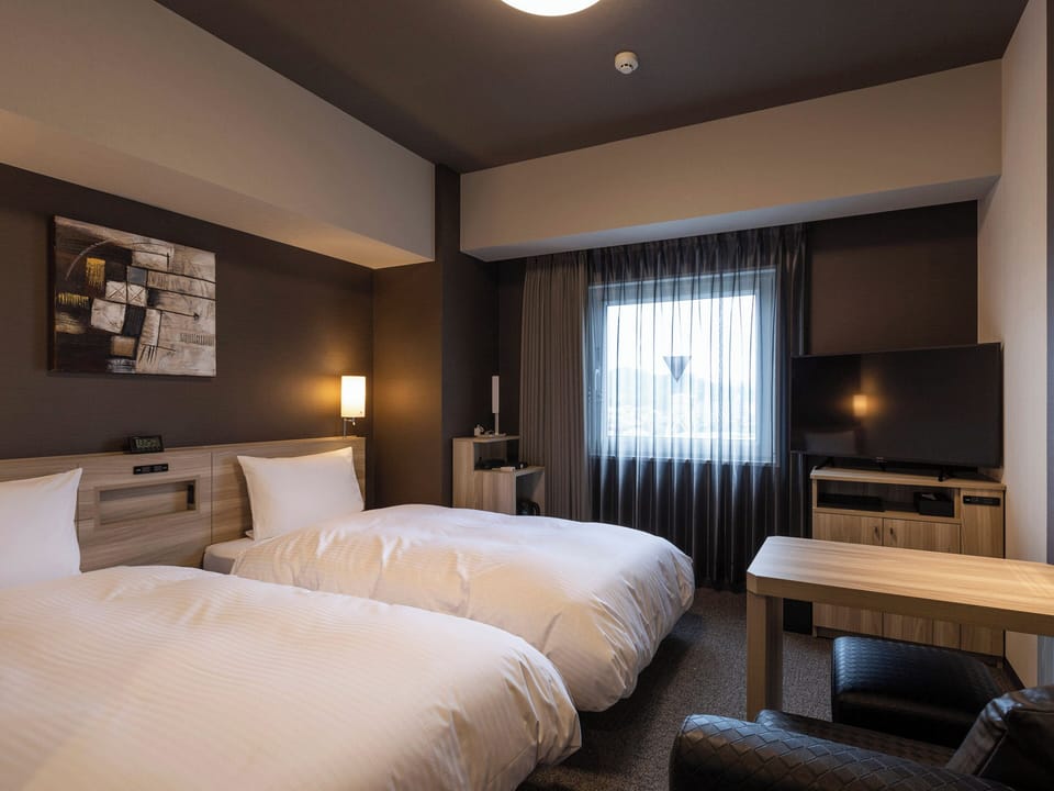 Twin Room, Non Smoking | Desk, laptop workspace, blackout drapes, iron/ironing board