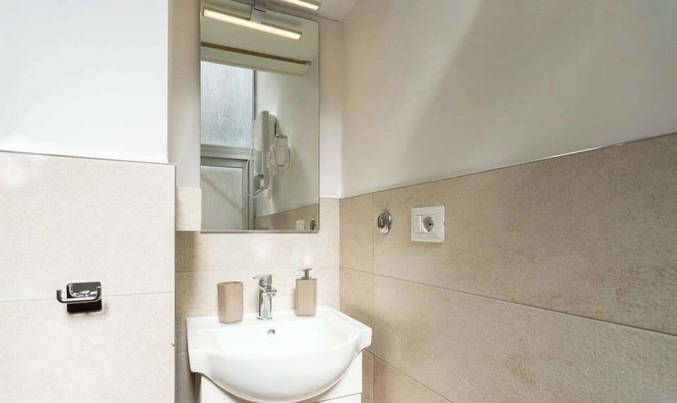 Double Room | Bathroom | Shower, hair dryer, towels, soap