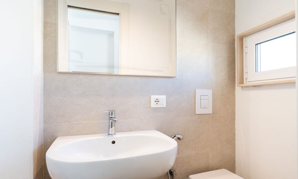 Double Room | Bathroom | Shower, hair dryer, towels, soap