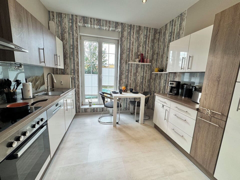 Kitchen, Countertop, Kitchen Appliance, Furniture, Flooring, Wood, Major Appliance, Cabinetry, Interior Design, Floor