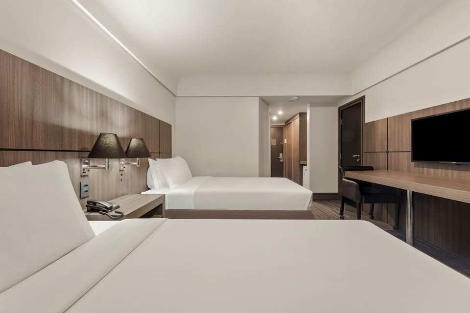 Deluxe Twin Room, 2 Twin Beds | Minibar, in-room safe, desk, free WiFi