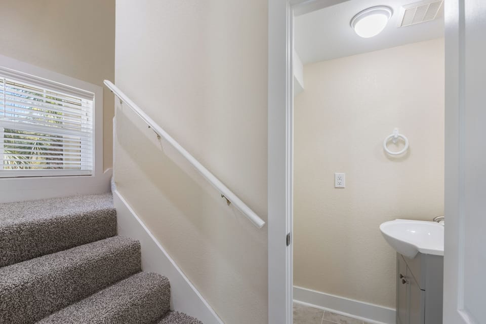 Free At Last! Purple Parrot 1C by PKRM - Half bath serves downstairs area.
