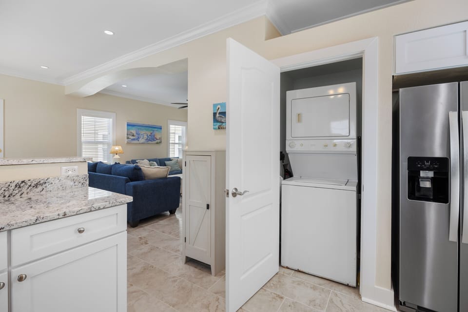 Purple Parrot 1C by PKRM - Granite counter tops, stainless appliances, fresh paint...and here is your washer and dryer for your beach towels.