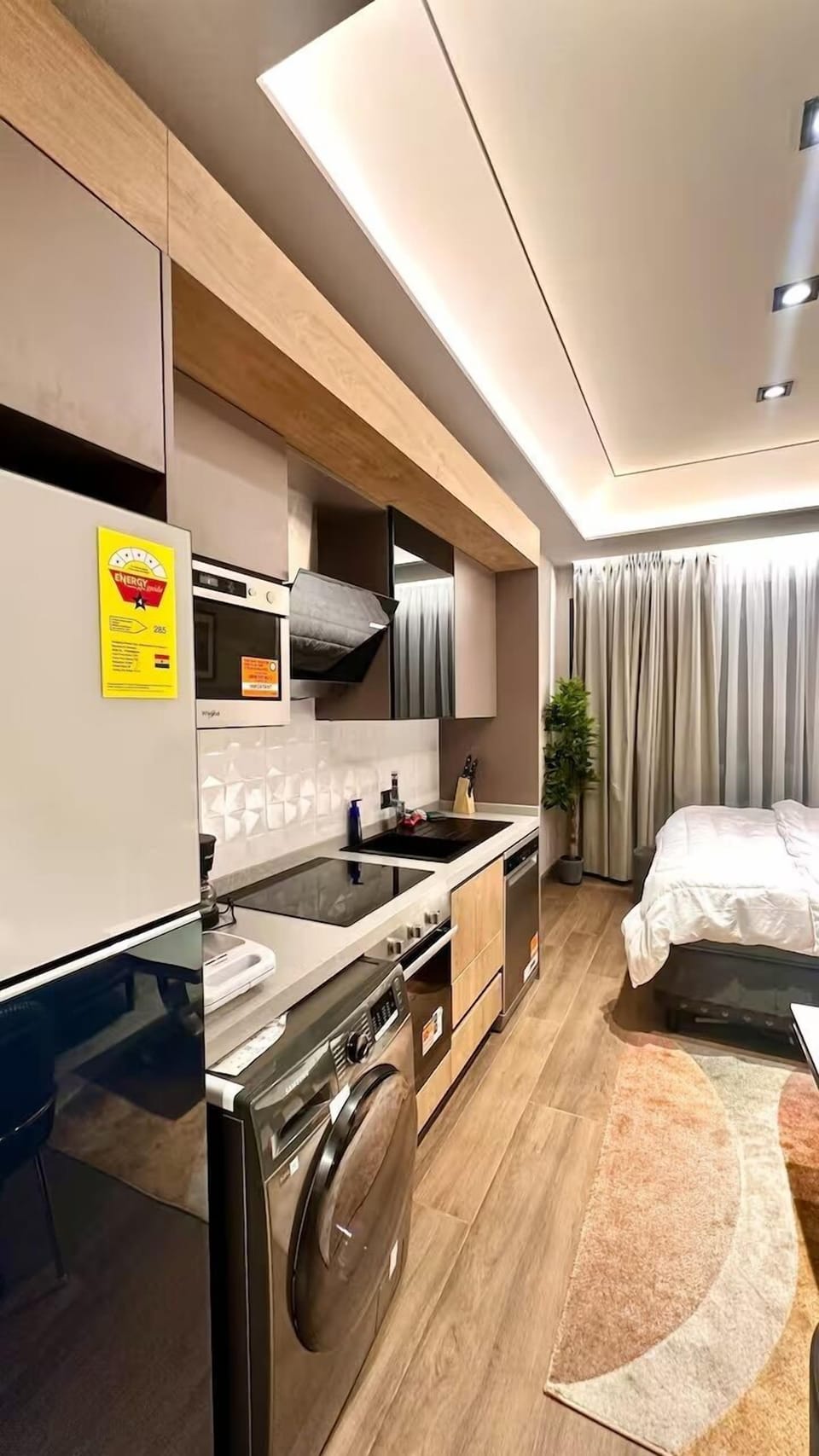 Deluxe Apartment, Courtyard View | Private kitchen | Fridge, microwave, oven, stovetop