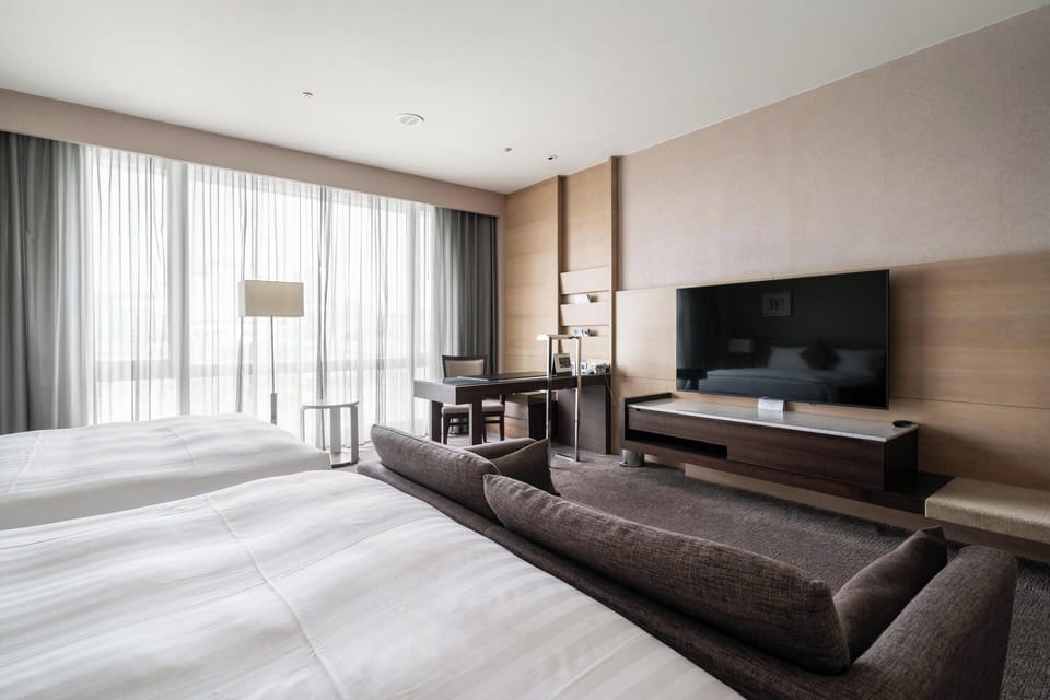 Deluxe Quadruple Room | Premium bedding, down comforters, minibar, in-room safe