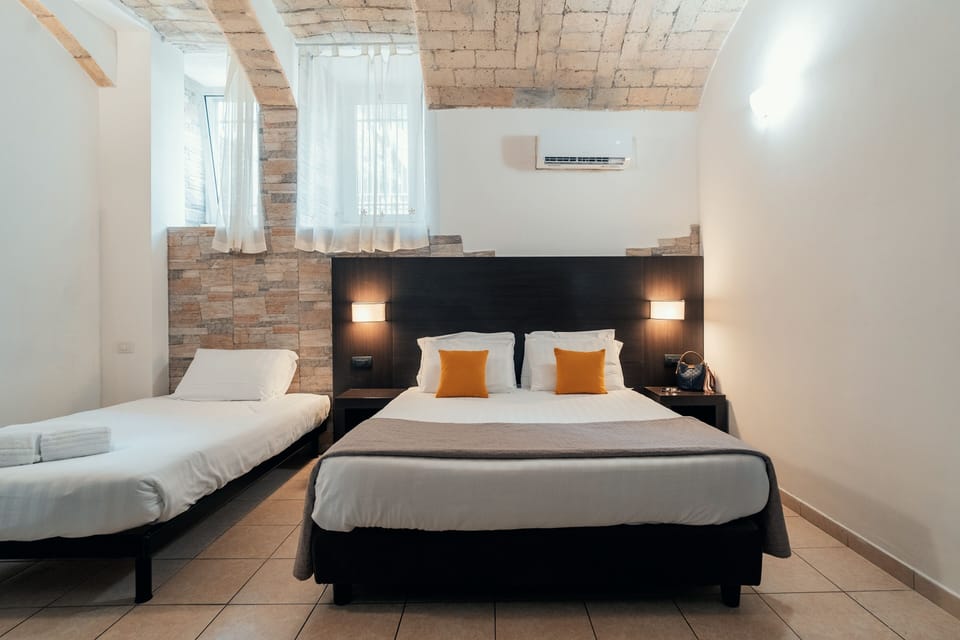 Classic Triple Room | Free minibar items, desk, laptop workspace, free WiFi