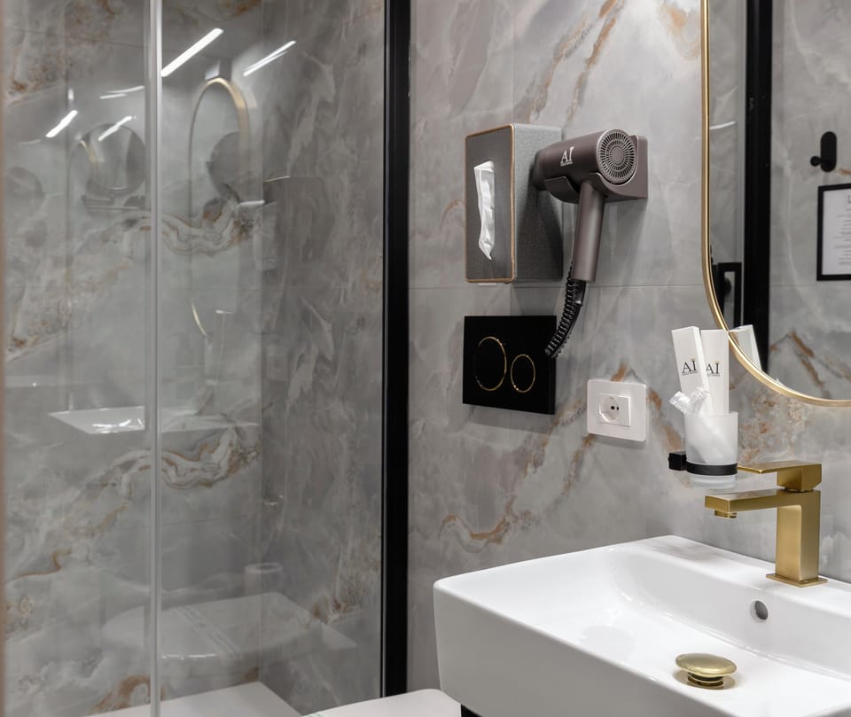 Signature Double or Twin Room | Minibar, in-room safe, desk, laptop workspace