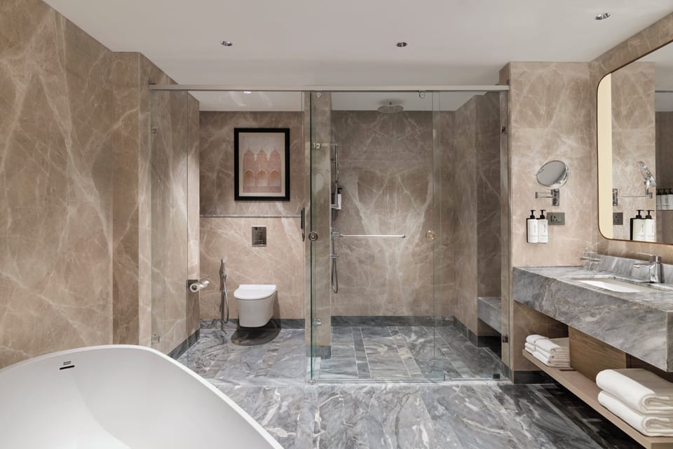 Suite, 1 Bedroom | Bathroom | Shower, rainfall showerhead, free toiletries, hair dryer
