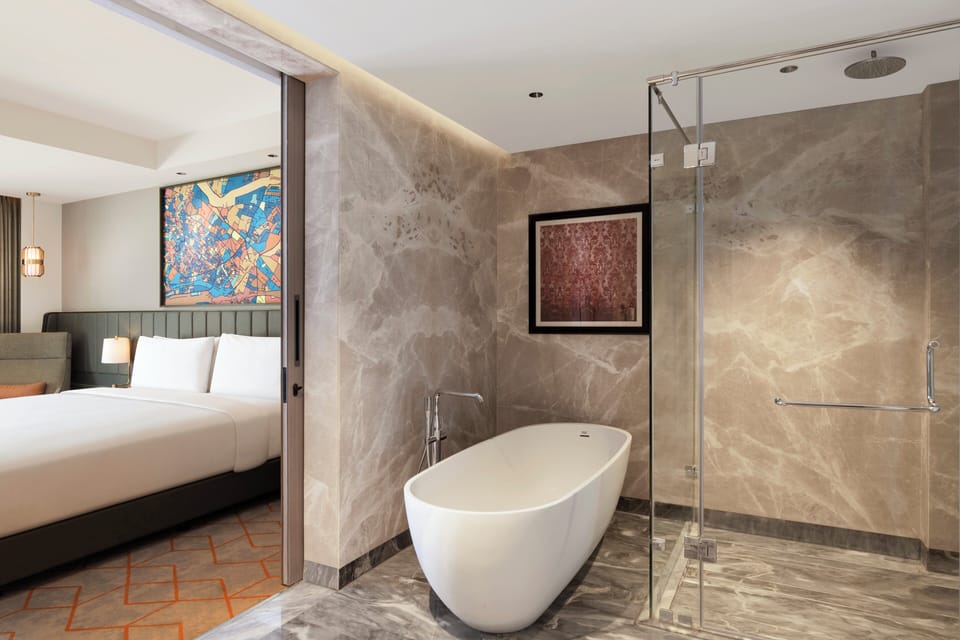 Shower, rainfall showerhead, free toiletries, hair dryer