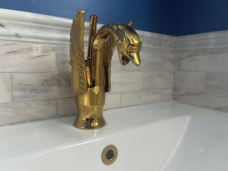 Gold fixtures add to the luxury.