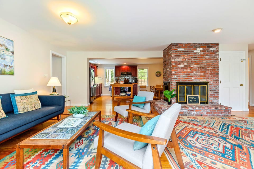 Our open-concept living room flows seamlessly into the kitchen for easy gatherings.