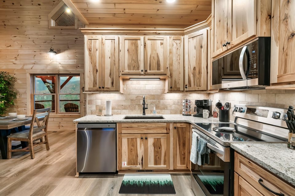 Enjoy preparing meals while surrounded by rustic charm and the serene mountain ambiance just outside the window.