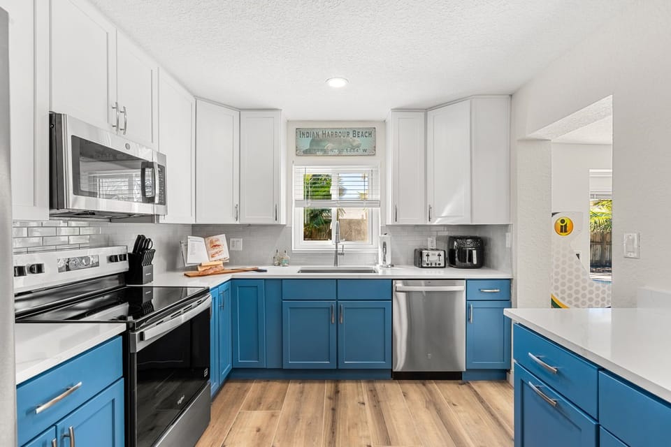 Brand new modern kitchen with stainless steel appliances is equipped with all the essentials for a perfect stay.