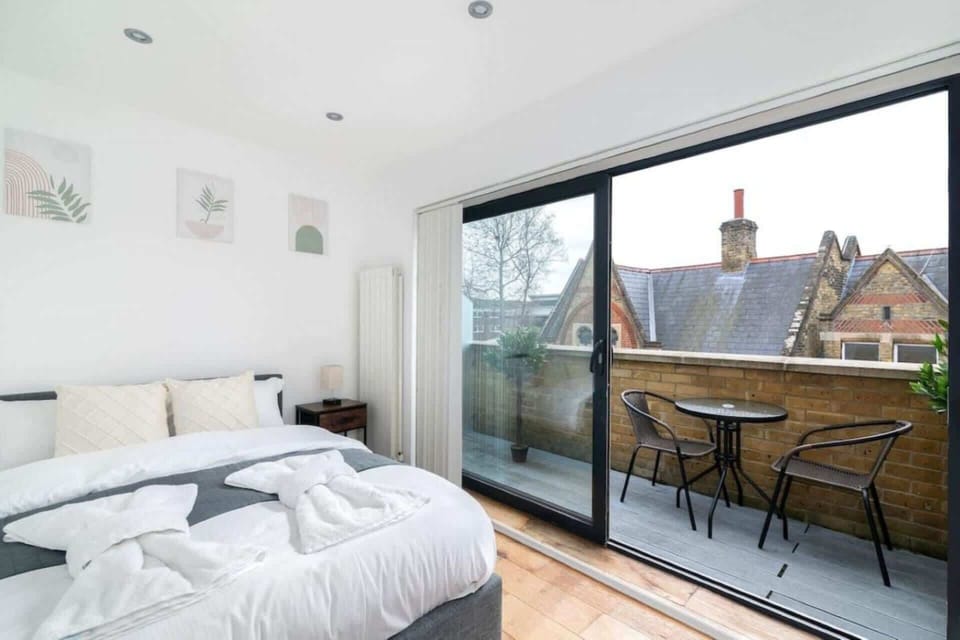 Bedroom 3 features a comfortable queen-size bed and direct access to a private balcony—the perfect retreat to relax, unwind and enjoy the fresh air